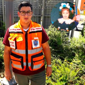 EMT Modechai Mammon superimposed is a picture of his sister
