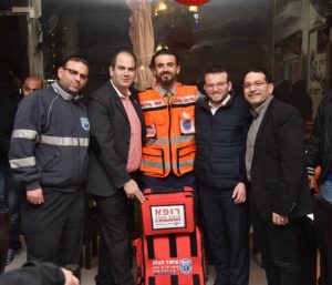 Dr. Murad Odeh (center) stands with the directors of United Hatzalah