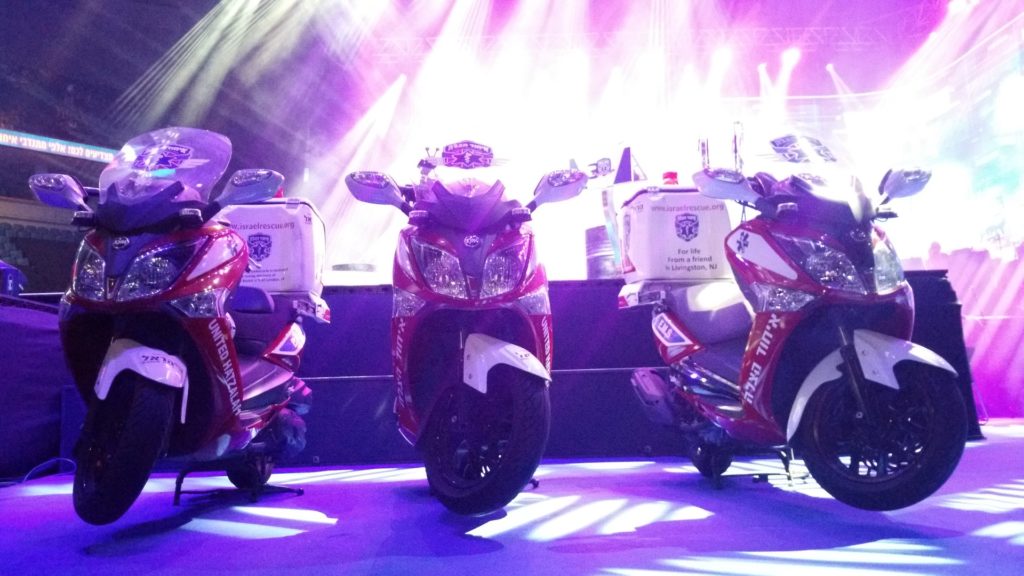 Ambucycles parked near the main stage