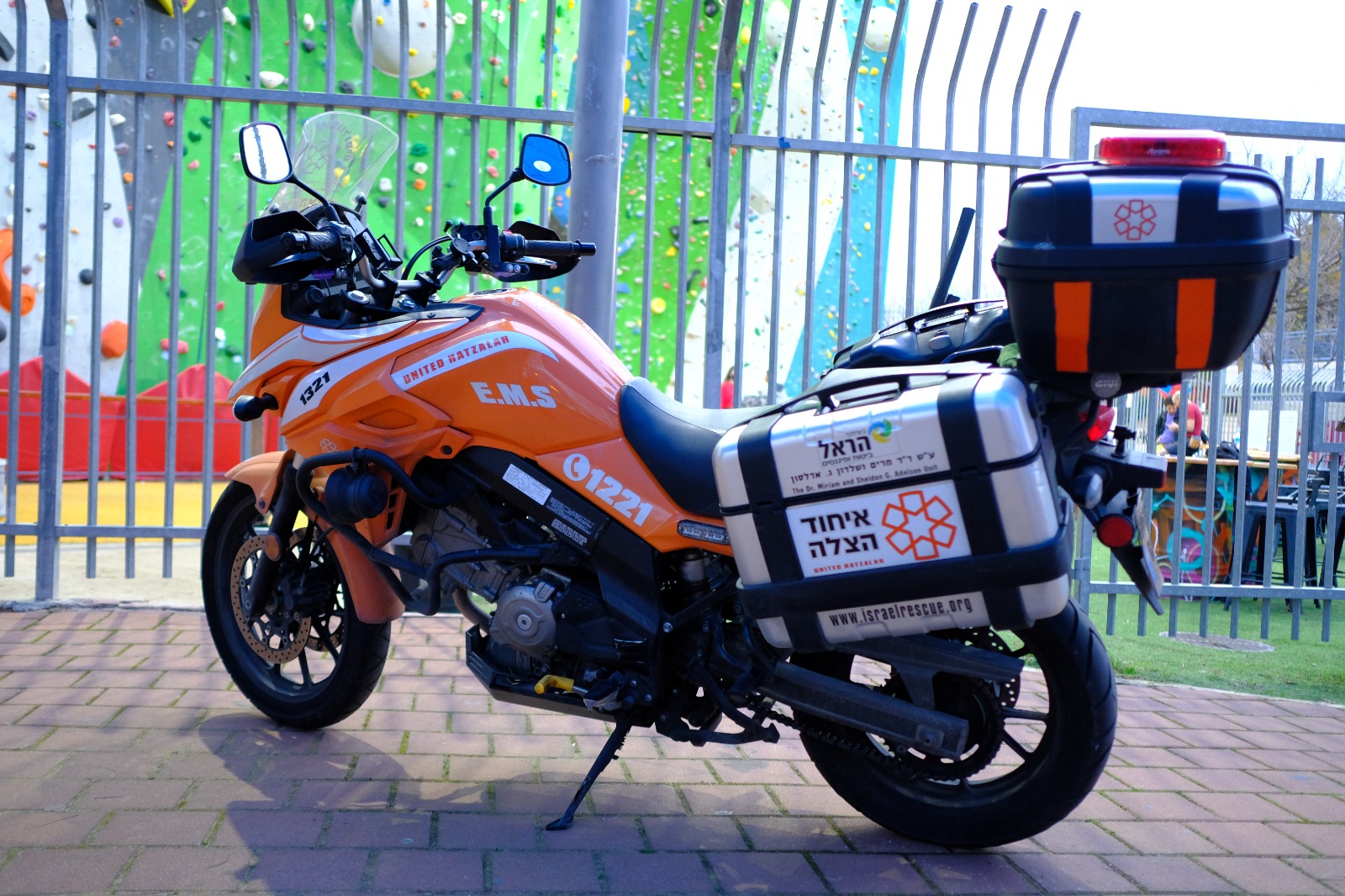 A UH ambucycle outside of a kindergarten illustration