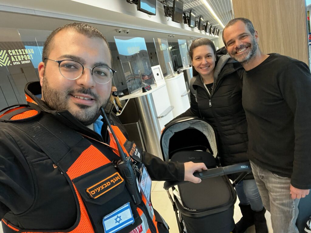 Aharon and the second set of new parents preparing to leave Moldova with their new daughter 1024x768 2