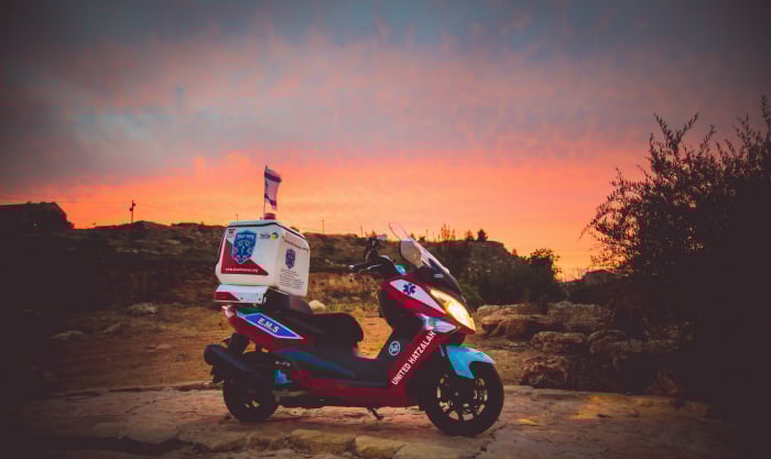 Ambucycle with flag 1 4