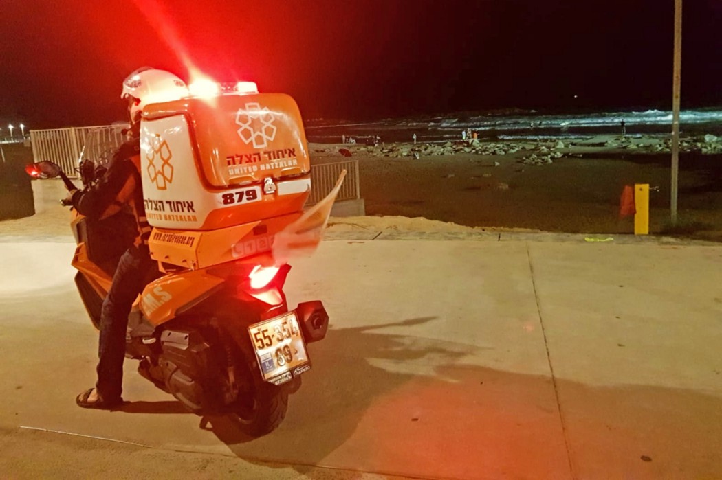 An ambucycle at night