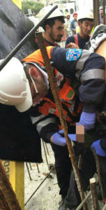 Avi Marcus saving a construction worker at the scene of an accident