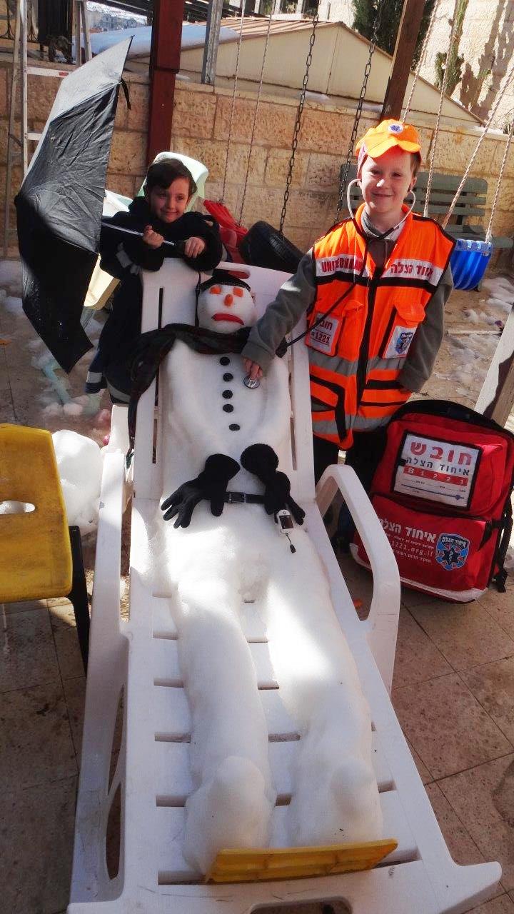 Brothers dress up as United Hatzalah volunteers for purim
