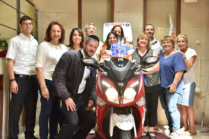Members of the Federation pose together with United Hatzalah Ambucycle driver 