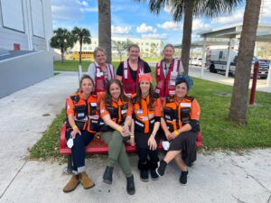 Einat second from left sitting together with other members of the PCRU and Red Cross at Fort Myers 300x225 1