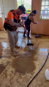 Friedson assisting in cleaning a home in Anasco Puerto Rico after Hurricane Fiona 169x300 2