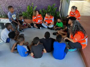 Gaby Luis Kamila Forkosh Lavan and Tamar Schlesinger working with a group of children 300x225 1
