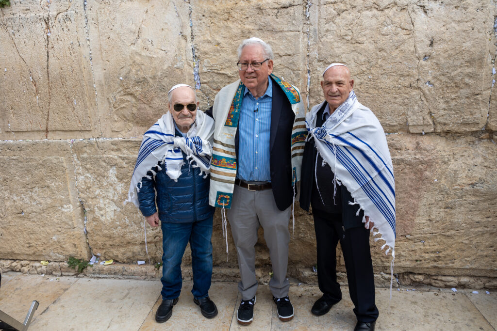 George center together with Oscar and Walter at their family reunion at the Western Wall during the Bar Mitvah 1024x683 1