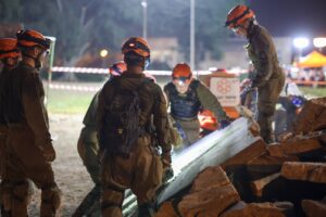 IDF Homefront Command search and rescue unit rescuing simulated trapped people from the wreckage 1 300x200 1