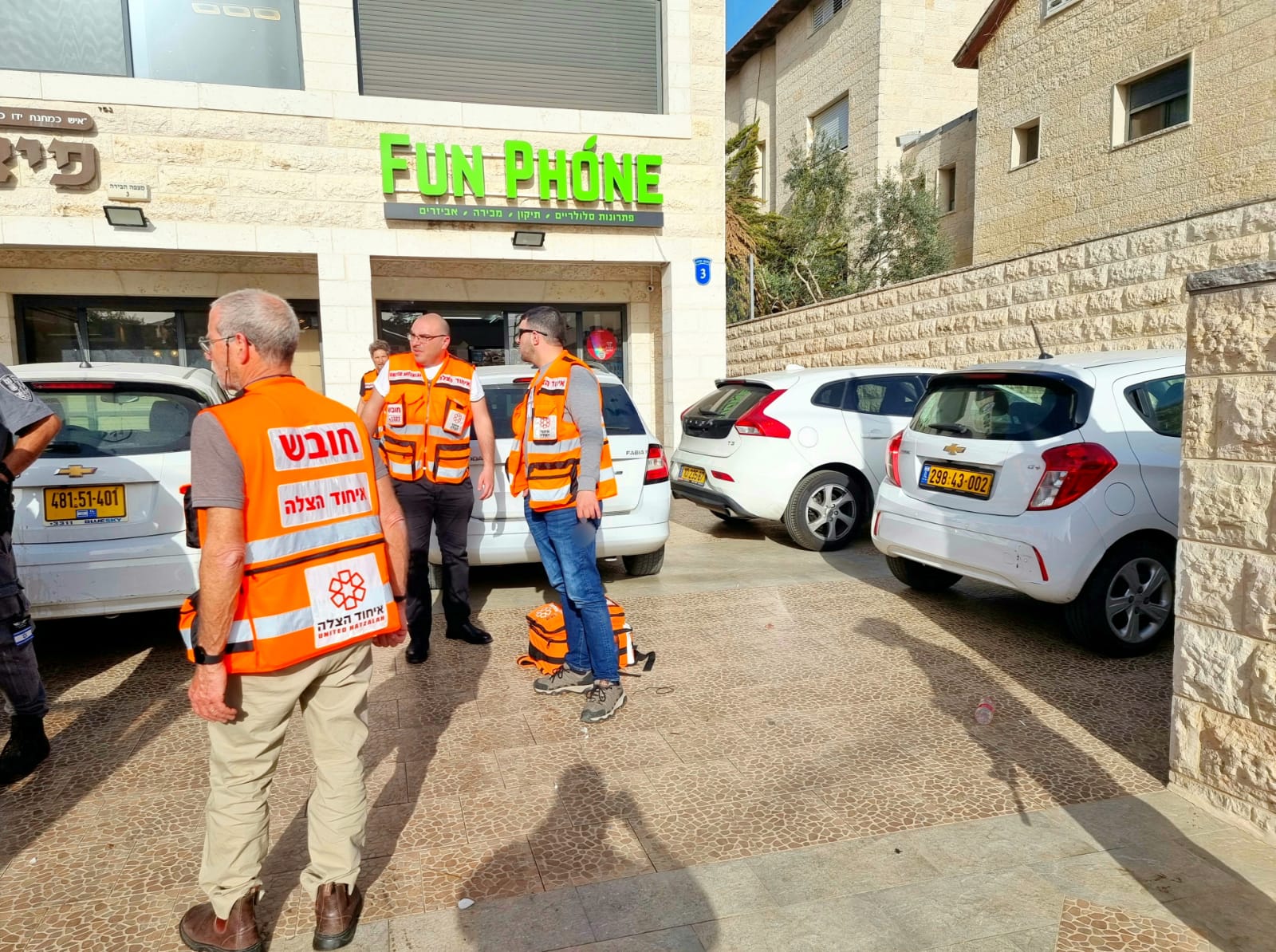 Idan together with other United Hatzalah volunteers at the scene
