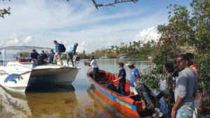 JET 911 team loading supplies onto a boat to reach an outlying island in need of medical care