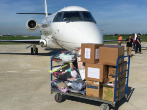 JET911 team offloading medical supplies in Haiti
