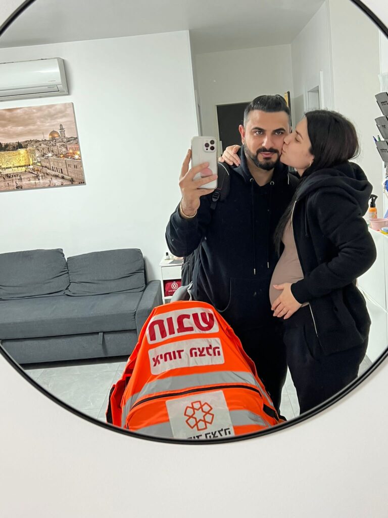Reuven saying goodbye to his wife Noa before the flight 768x1024 2