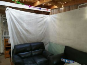 Couch that the toddler landed on after falling through the roof of the sukkah.   