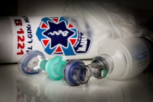 An infant sized BVM attached to an oxygen pump. (illustrative)