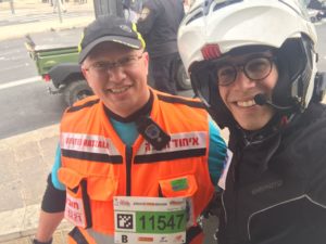 Poch and ambucycle driver Daniel Shore at the scene after treating the woman.