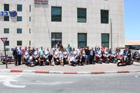 United Hatzalah staff pose in front of Jerusalem headquarters